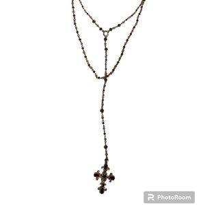 Layered cross necklace.